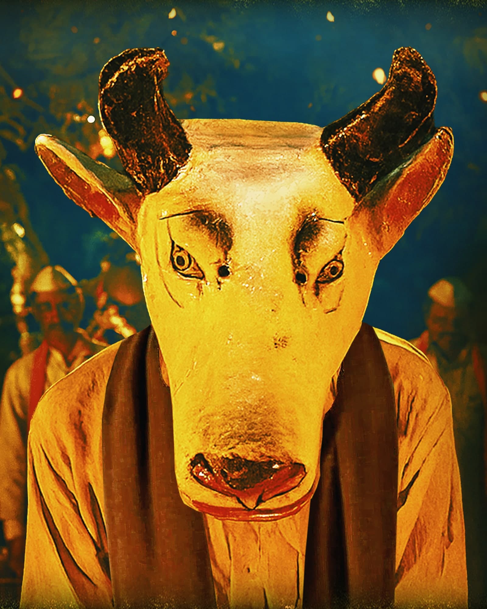 Gondhal key art: a performer in a white bull mask with dark horns stands before torch-lit villagers at night. Text: India’s official entry, 99th Academy Awards, The Oscars 2027. Gondhal. Sacred obsession. A film by Santosh Davakhar & team. Below, the film’s credits; top right, the Davakhar Films logo.